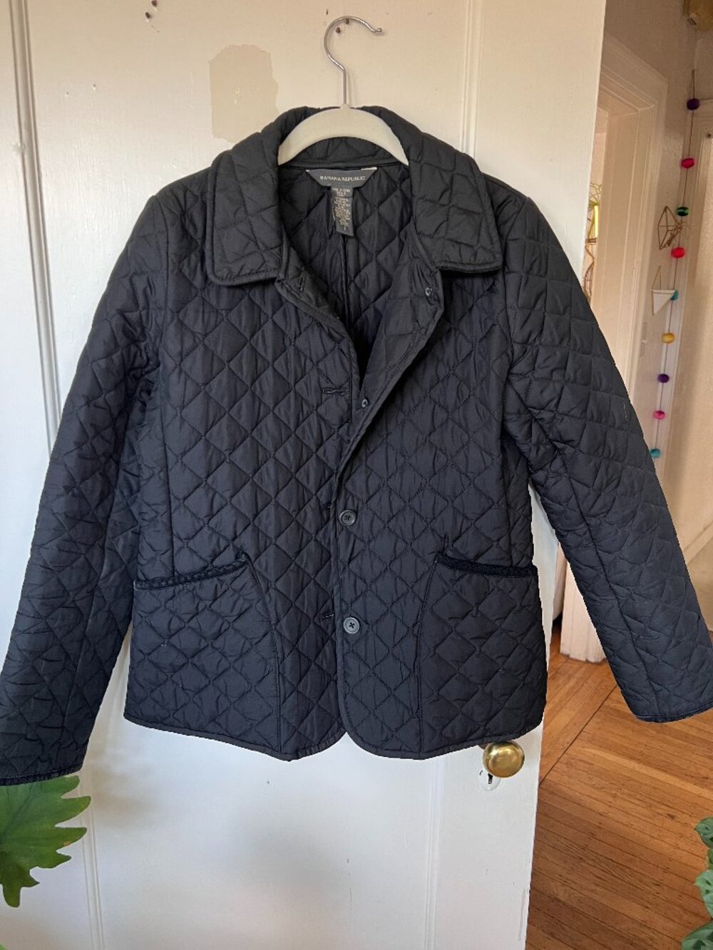 Black quilted puffer jacket